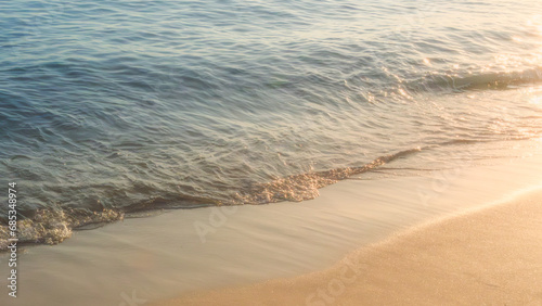 Fototapeta Naklejka Na Ścianę i Meble -  Soft beautiful ocean wave on sandy beach. Background.