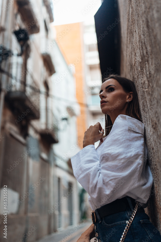 Beautiful woman tourist at the centre of old town of Tartagena Beautiful woman tourist at the centre of old town of Tartagena