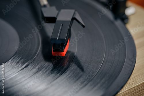 Classic vinyl record player closeup.