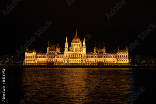 Night shot of the Parliament building in Budapest. Hungary. The building of the Hungarian Parliament is located on the banks of the Danube River, in the center of Budapest.