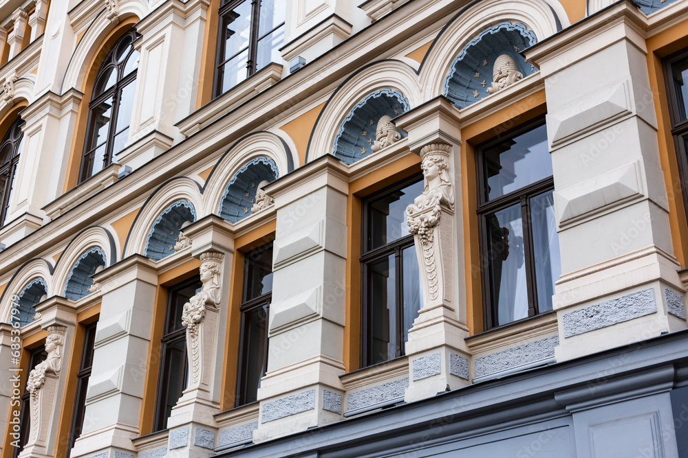 Art nouveau modernist building facade restored in Riga's old town district, Latvia