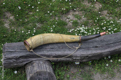 A wind musical instrument made of horn. photo