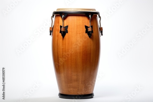 Wooden conga drum isolated on a white background. Traditional percussion musical instrument of Afro-Cuban and Latin American culture. Suitable for music-related projects and cultural designs. photo
