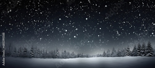 Perfect for digital composition and post-production, this wide angle shot features heavy snowfall with real snowflakes, captured on a black background, using a matte technique for isolation. © 2rogan