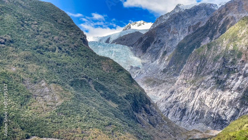 Views of the Franz Josef Glacier from the lookout at the mid way observation point on the track through native bush