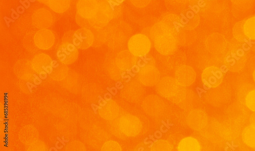 Orange bokeh background for seasonal, holidays, event celebrations and various design works