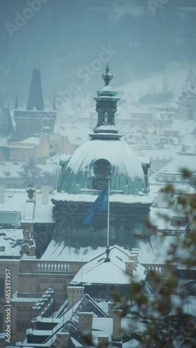 landscape in winter in Prague, Czech Republic with Straka Academy dome. photo