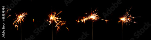 Set of Christmas sparklers on black background