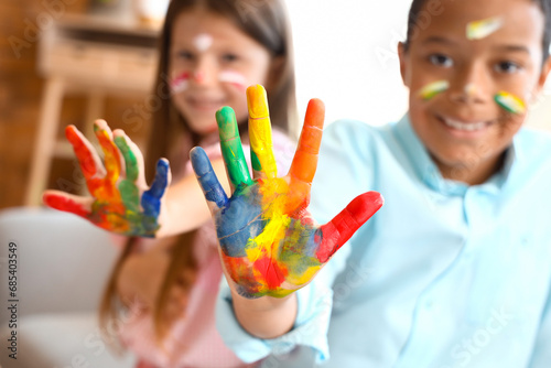 Cute little children in pai...