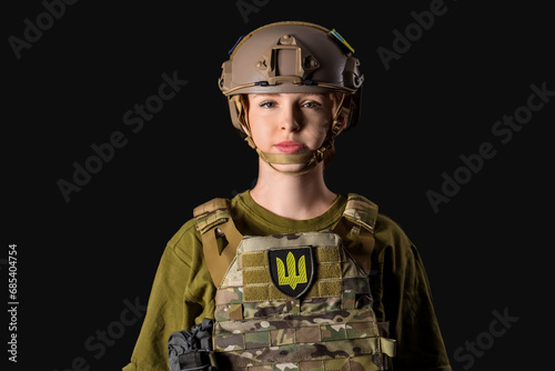 Young female soldier on bla...
