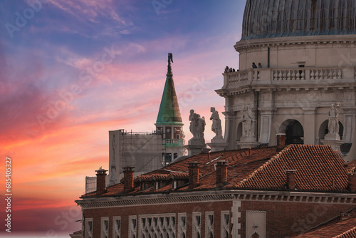 View from Campanile di San Marco to Basilica of St Mary of Health or Basilica di Santa Maria della Salute at summer morning in Venice, Italy photo