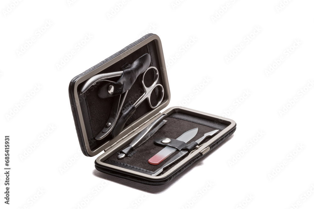 Set of steel manicure instruments and tools in black leather case isolated on white background Set of steel manicure instruments and tools in black leather case isolated on white background