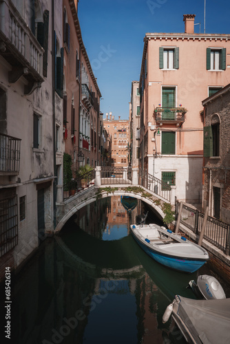 Canal with two gondolas in Venice, Italy. Architecture and landmarks of Venice. Venice postcard with Venice gondolas. © Aerial Film Studio