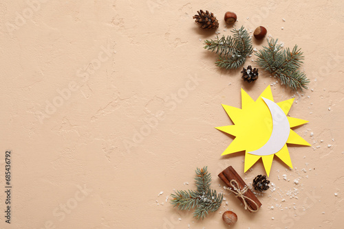 Paper sun with crescent, fi...