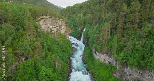 Cascades Along Rauma River Near Kylling Railway Bridge In Møre og Romsdal County, Norway. Aerial Drone Shot photo