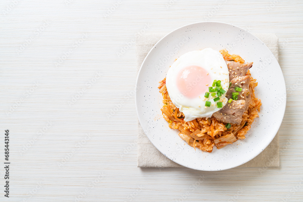 Kimchi fried rice with fried egg and pork Kimchi fried rice with fried egg and pork