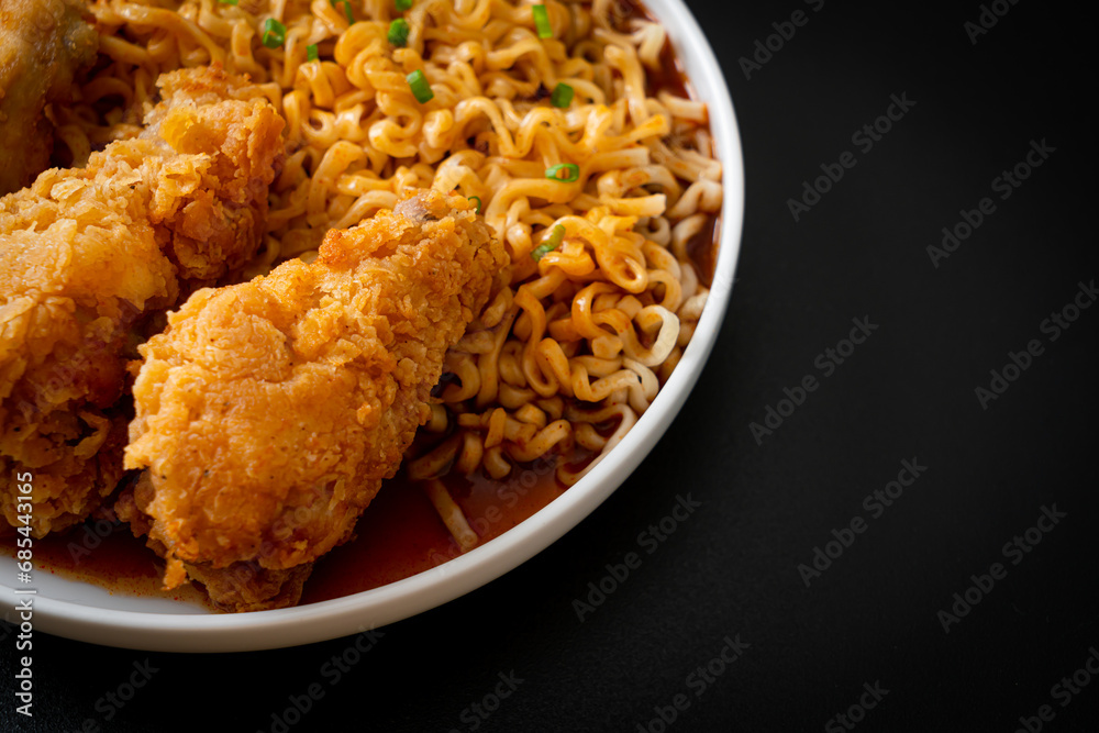Korean instant noodles with fried chicken or Fried chicken ramyeon Korean instant noodles with fried chicken or Fried chicken ramyeon