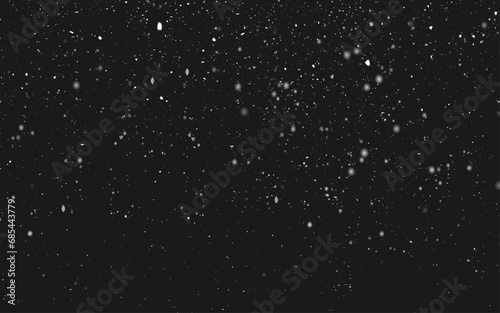 Flying dust particles on a black background. white flying motion on black background  Romantic flying flower petal backdrop  Particles Flying on black