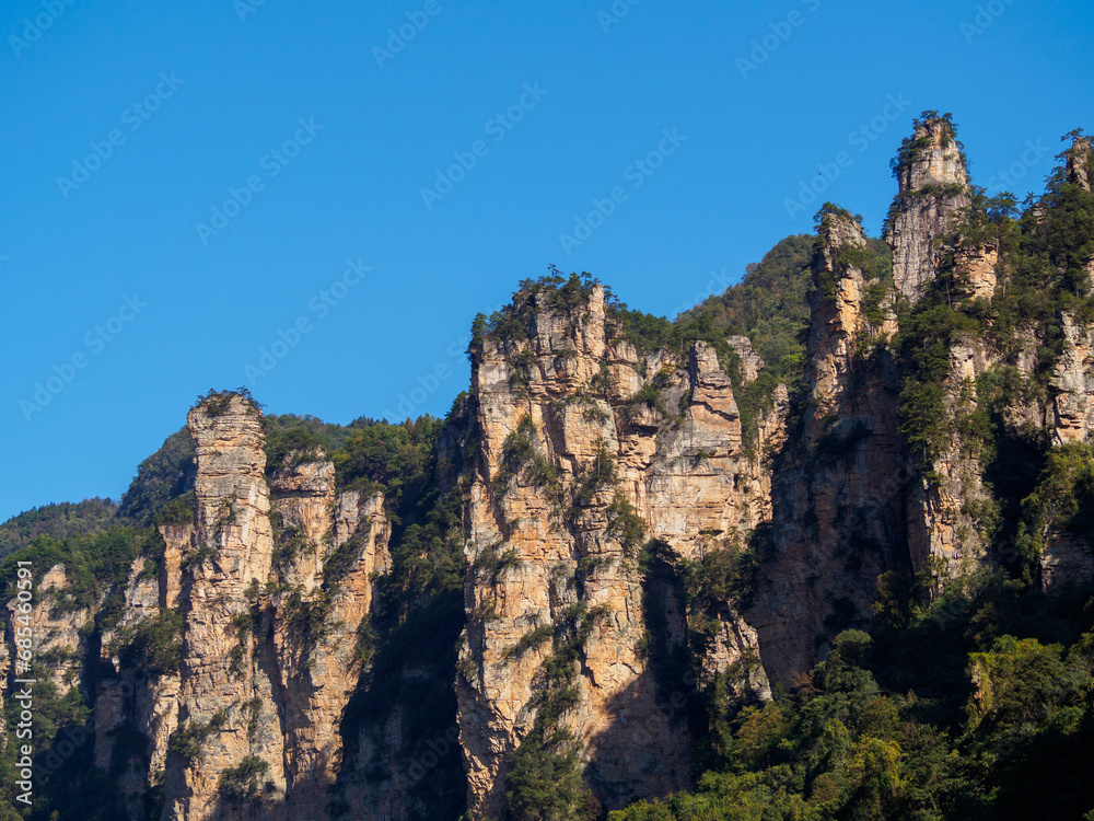 Awesome view of natural quartz sandstone pillars of the Tianzi Mountains (Avatar Mountains) in the Zhangjiajie National Forest Park ( Wulingyuan), Hunan Province, China.