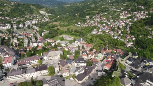 Beautiful balkan city Jajce in Bosnia and Herzegovina, aerial orbit skyline photo