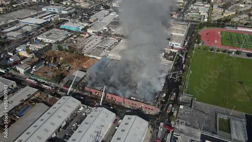 Firefight at large industrial building - aerial photo