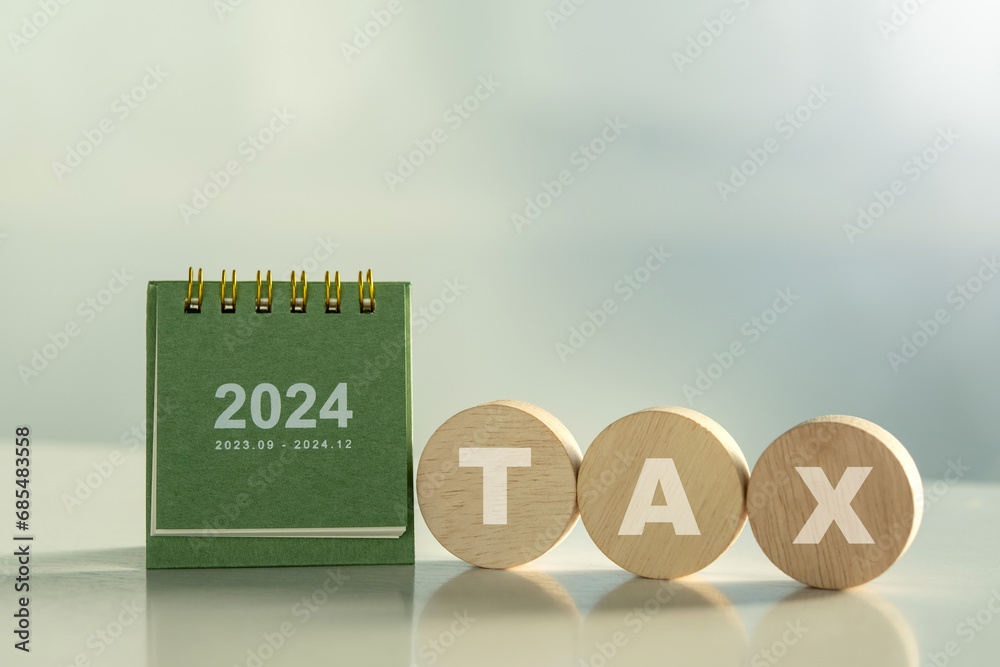 Tax wooden With Calendar 2025 .Pay tax in 2025 years. The new year 2025