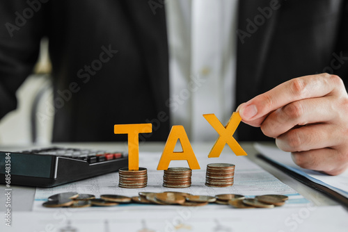 Business TAX plan development for fill in the income tax online return form for payment. Financial research,government taxes and calculation tax return concept. photo