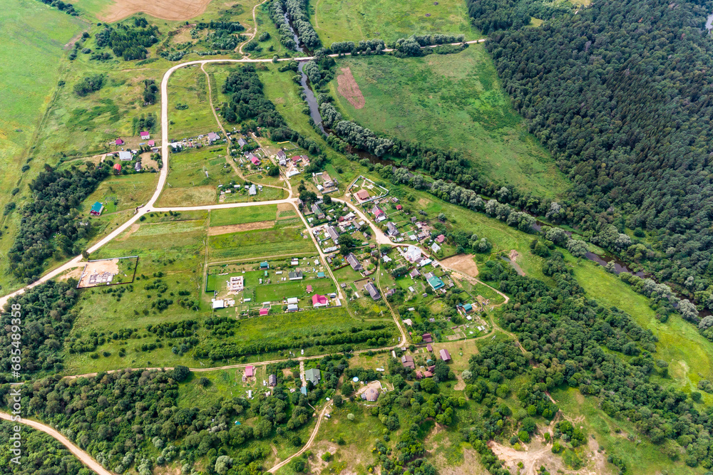 Aerial view of the village of Ignatievskoe Otdeleniye in the area of the Luzha River, Maloyaroslavetsky district, Kaluga region, Russia
