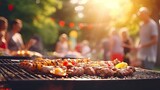 Grilled food and meat on barbecue with people celebrating picnic outdoors