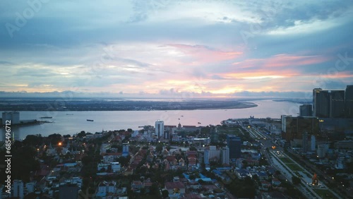 Aerial timelapse panning across downtown and the Mekong River in Phenom Penh, Cambodia. photo