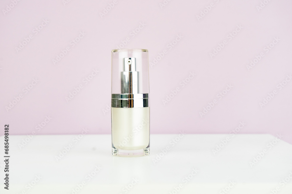 Cream container isolated on pink background cosmetic glass bottle Cream container isolated on pink background cosmetic glass bottle