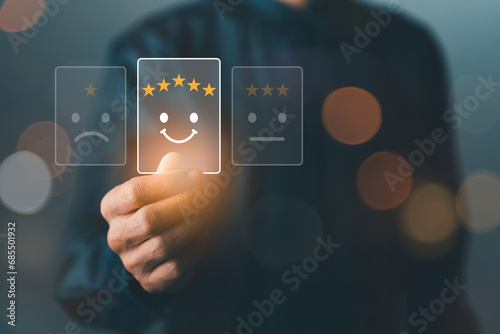 Customer satisfaction survey concept, customer feedback, the best service from employees, users give a 5-star rating online digital business, best experience in service from a reputable organization. photo