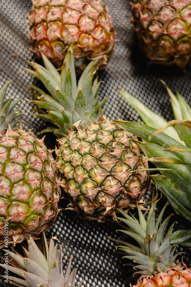 fresh pineapple on the table, fruit market display fresh pineapple on the table, fruit market display