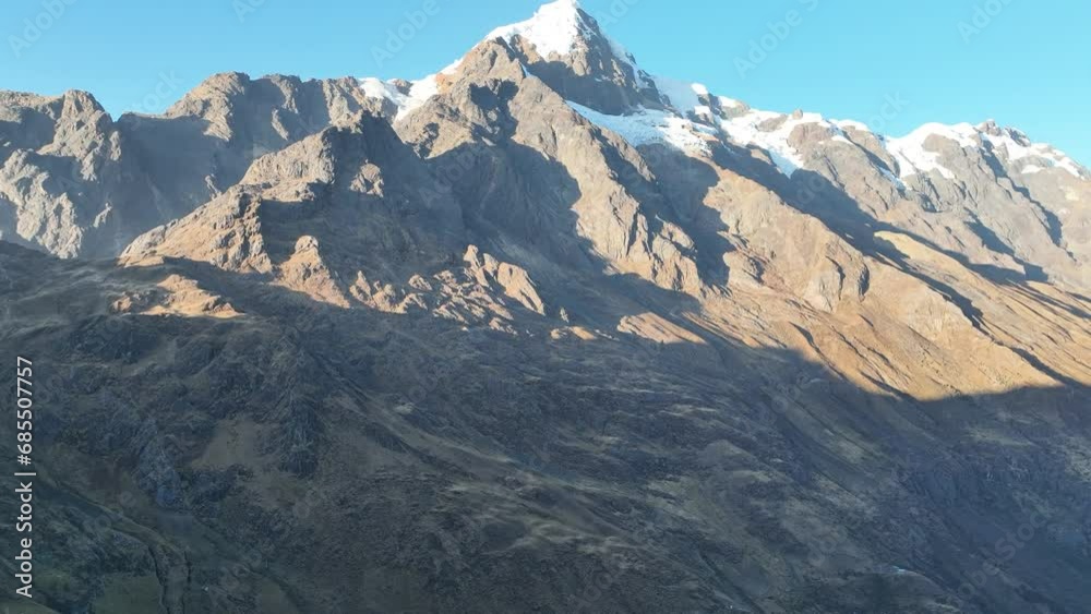 Flying view of the mountains, snow-capped La Veronica, Sacred Valley, Cusco Flying view of the mountains, snow-capped La Veronica, Sacred Valley, Cusco
