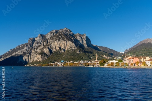 Lecco on the shores of Lake Como with mountain landscape in the background © makasana photo