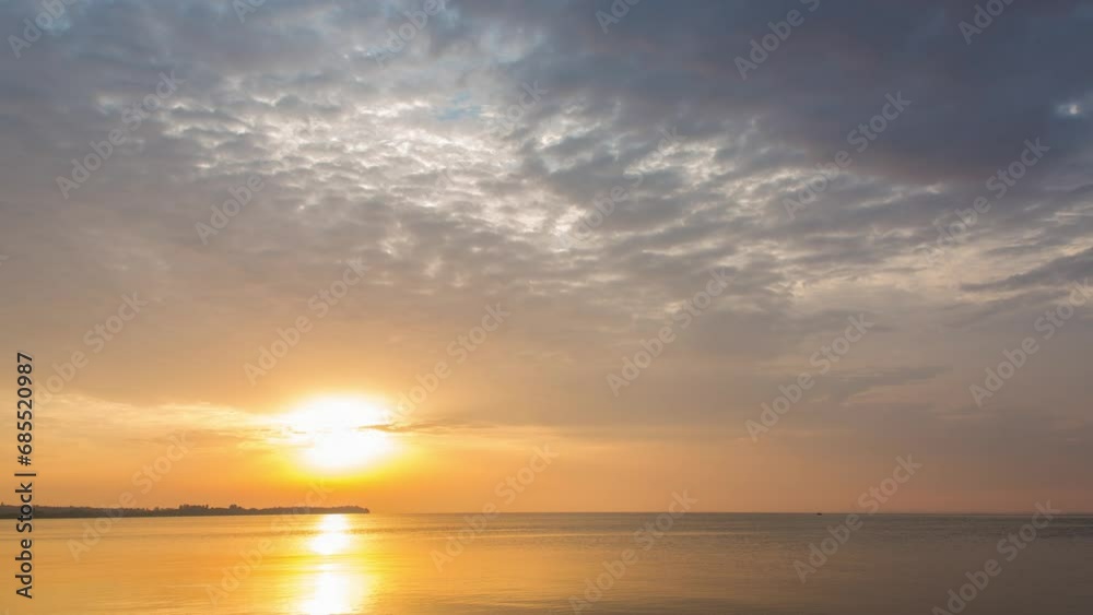 Sunrise with fast moving clouds on orange sky, religion, calm river, timelapse Sunrise with fast moving clouds on orange sky, religion, calm river, timelapse