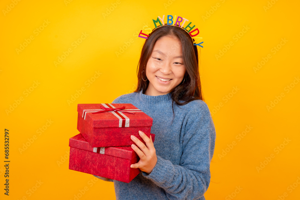Chinese woman receiving gifts for her birthday Chinese woman receiving gifts for her birthday
