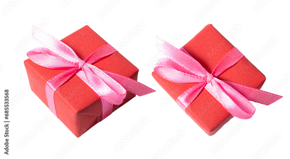 Red gift with pink bow ribbon, isolated on white or transparent background cutout. Red gift with pink bow ribbon, isolated on white or transparent background cutout.