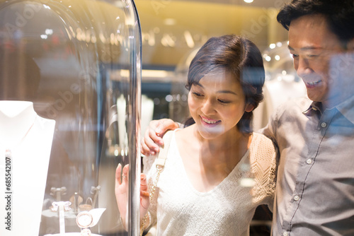 Sweet couple in jewelry store photo
