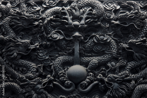 Chinese carving depicting a dragon photo