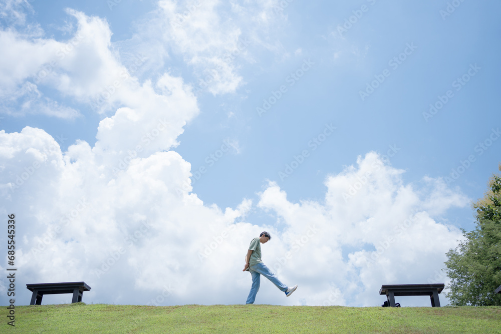 solo man happy and enjoy with summer travel with cloudy background solo man happy and enjoy with summer travel with cloudy background