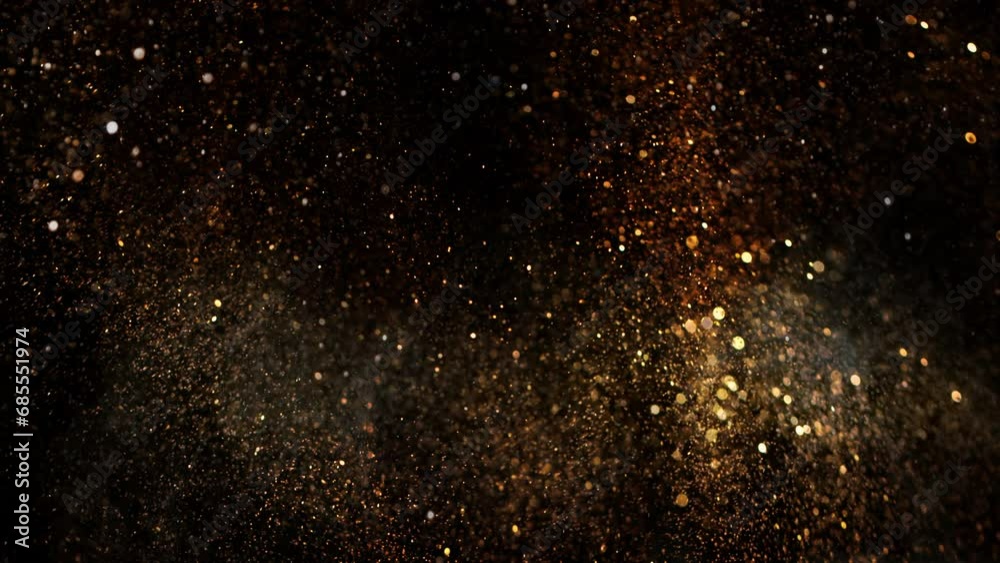 Super Slow Motion Shot of Festive Golden Glittering Background at 1000fps.