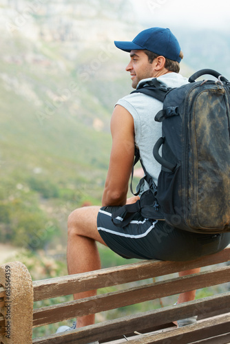 Fitness, happy man and rest of nature hiking with backpack for workout, training and exercise view. Hiker, person and smile on relax mountains for health, wellness and sports for Brazil summer break