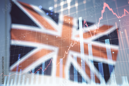 Multi exposure of virtual creative financial chart hologram on British flag and blue sky background, research and analytics concept photo