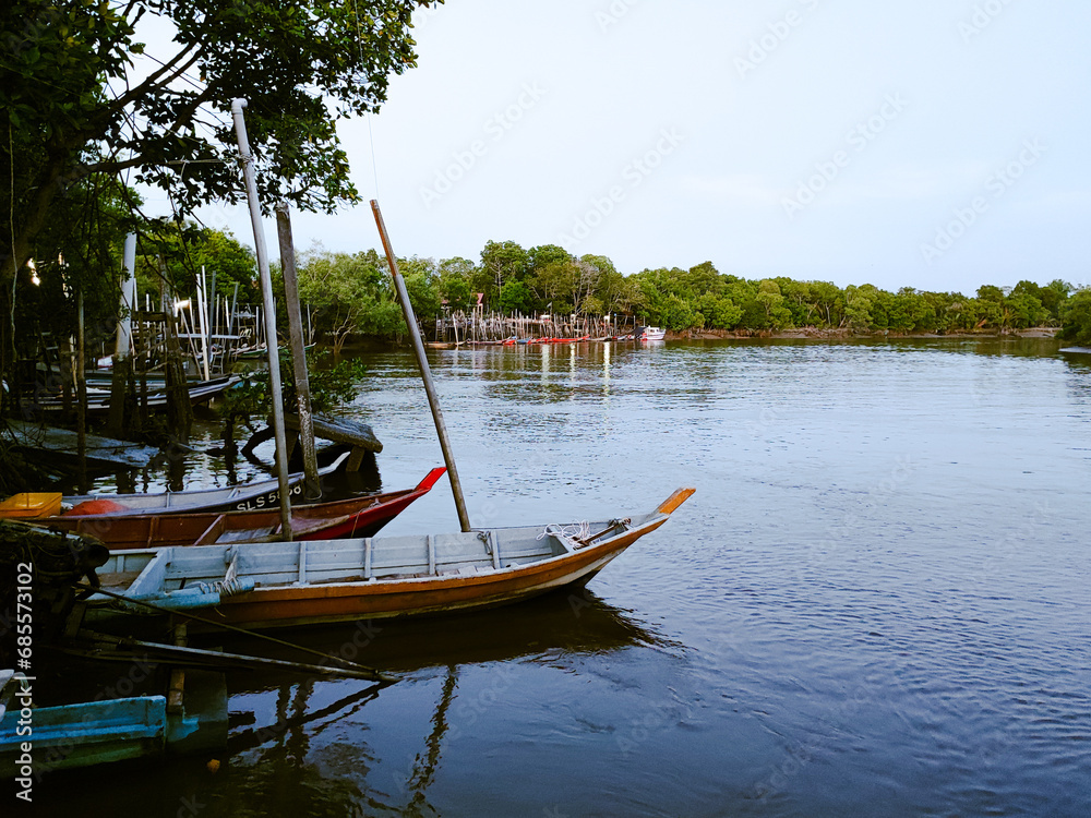 a jetty where all the fishermen park their boats. Location: Tanjong Karang, Selangor, Malaysia