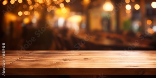 Empty wooden table with blurred restaurant background