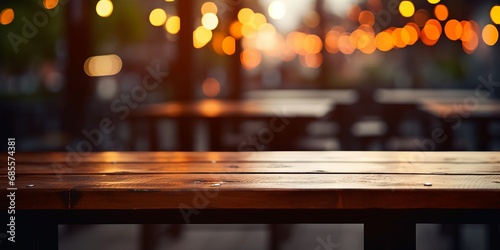 Empty wooden table with blurred restaurant background © ParinApril