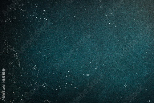 Blue texture background. Top view. On a dark background. Free space for text.