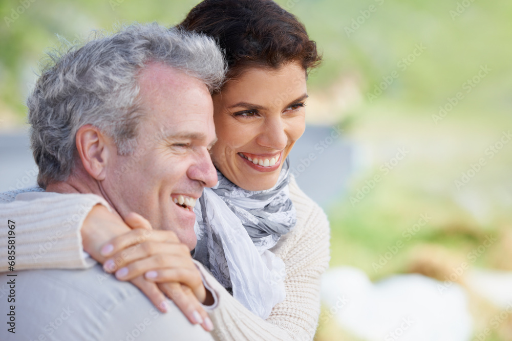 Couple, face and laughing in nature with hug for romance, love and relationship outdoor with date. Mature, man and woman or embrace with happy, marriage and trust for bonding, honeymoon and support Couple, face and laughing in nature with hug for romance, love and relationship outdoor with date. Mature, man and woman or embrace with happy, marriage and trust for bonding, honeymoon and support