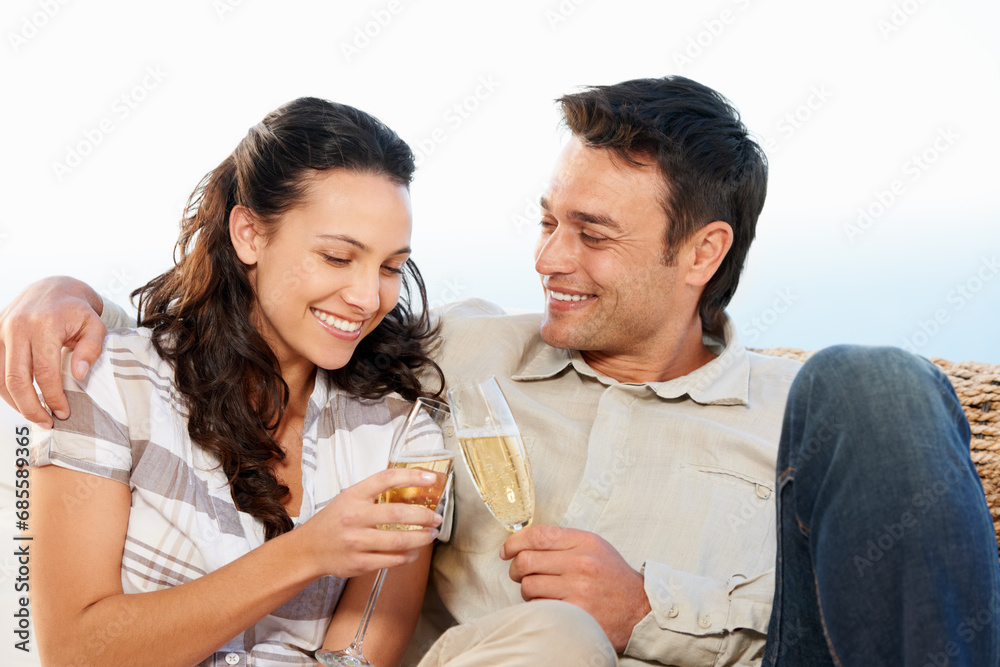 Couple, drinking champagne and toast for honeymoon and good news for celebration, announcement and love. Looking at wife, smile and happy with romantic gesture, bonding together and anniversary Couple, drinking champagne and toast for honeymoon and good news for celebration, announcement and love. Looking at wife, smile and happy with romantic gesture, bonding together and anniversary